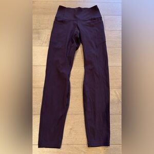 Women’s extra small Patagonia leggings with pockets, plum color